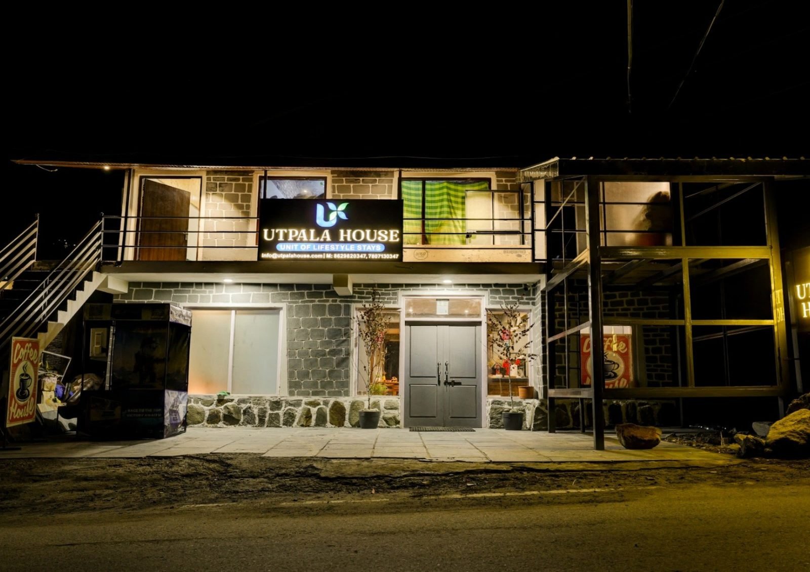 Utpala House Sissu hotel exterior at night